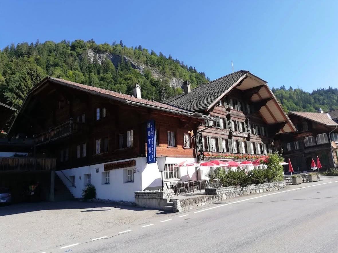 Street view of Hotel Simmental’s traditional chalet exterior
